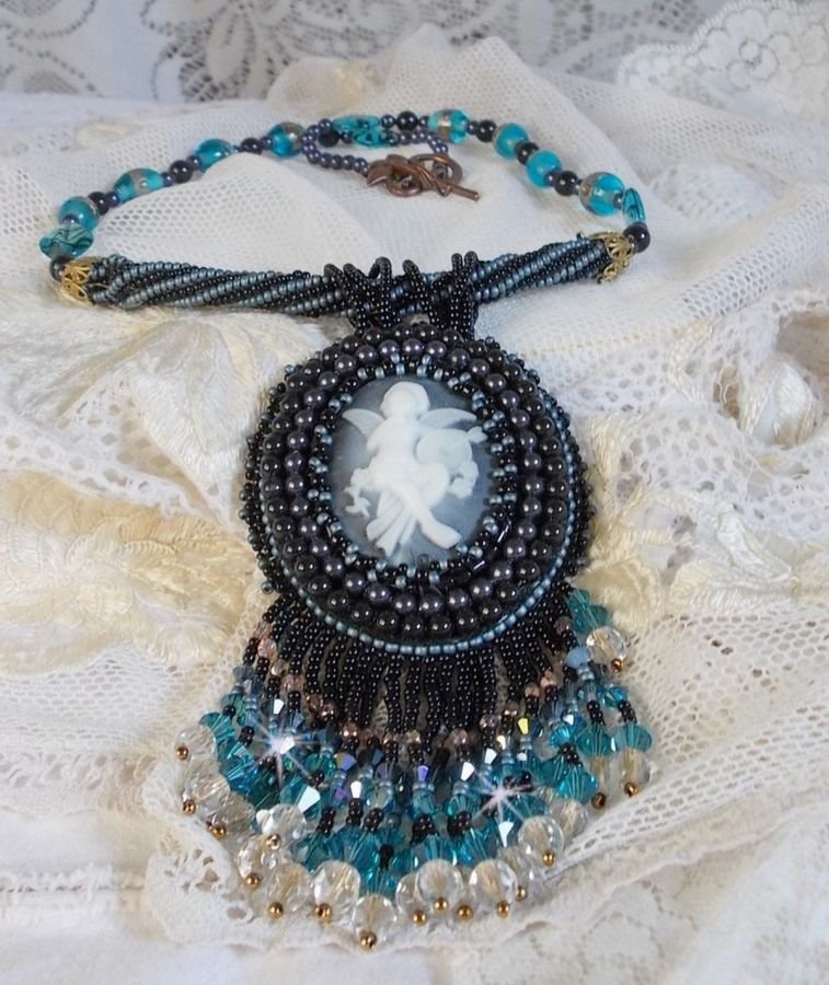 Angelot pendant necklace embroidered with an acrylic Angel, Swarovski crystal spinning tops and Japanese seed beads