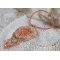 Coral pendant necklace embroidered with a metal star and cultured pearls 