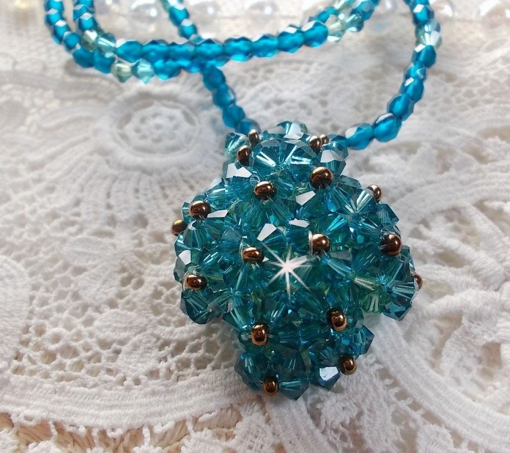 Emerald pendant necklace with Swarovski crystal spinners and facets