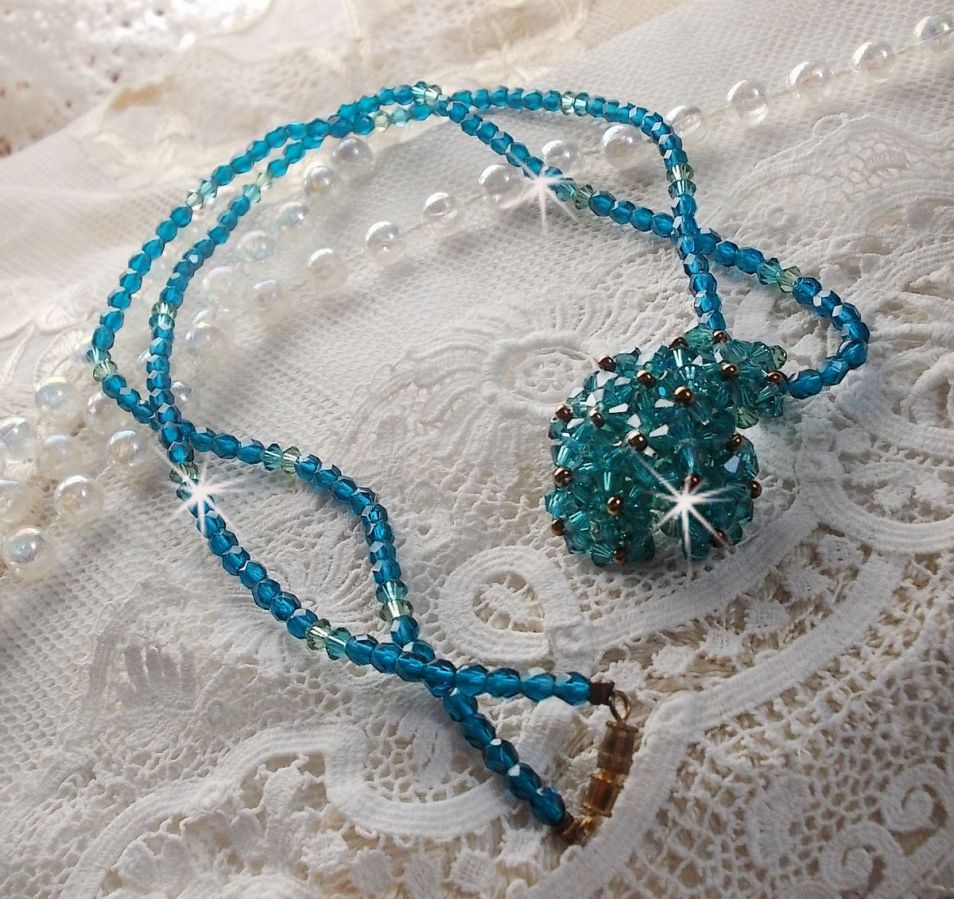 Emerald pendant necklace with Swarovski crystal spinners and facets