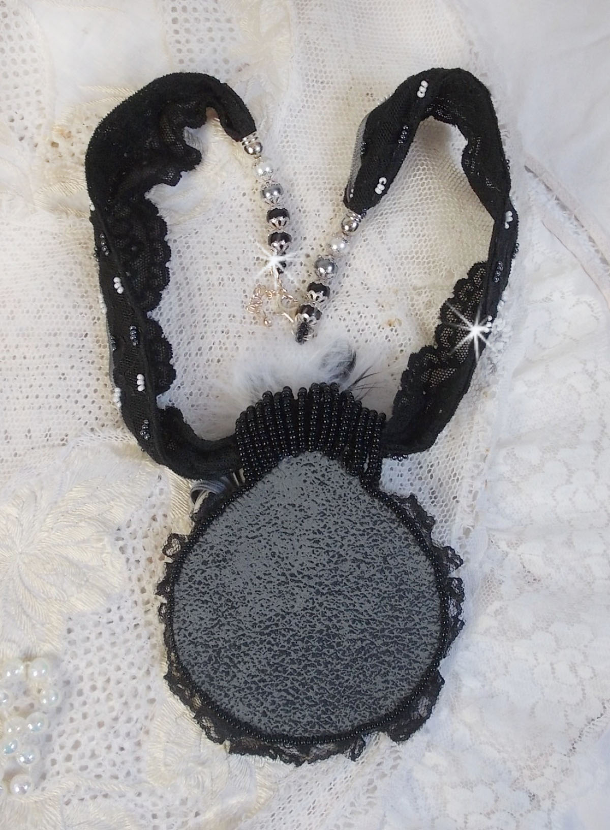 Black Feerie pendant necklace with a beautiful silk and pearl hat.
