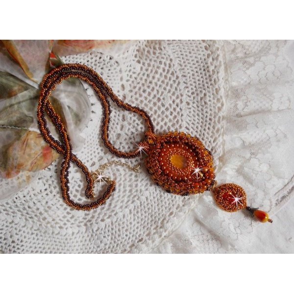 Lady in Orange pendant necklace is embroidered with Swarovski crystals, Miyuki seed beads and magic beads.