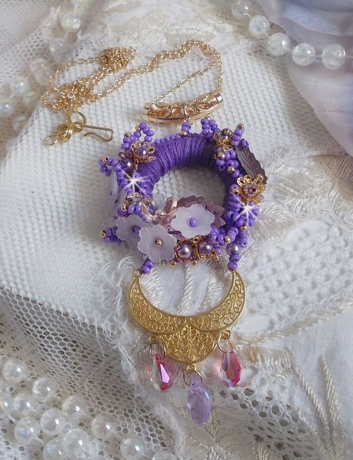 Laureline pendant necklace embroidered with purple DMC cotton, Swarovski crystals and frosted flowers.