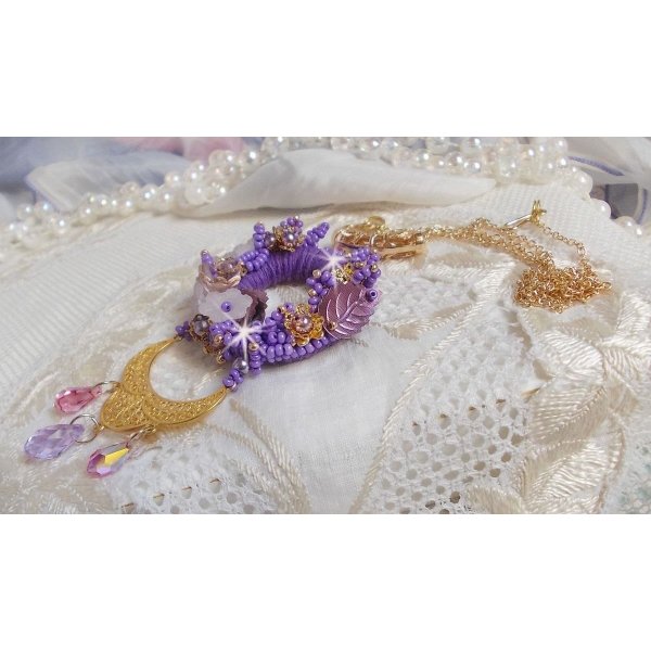 Laureline pendant necklace embroidered with purple DMC cotton, Swarovski crystals and frosted flowers.