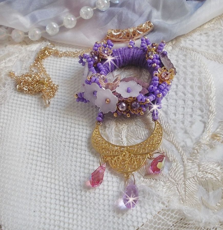 Laureline pendant necklace embroidered with purple DMC cotton, Swarovski crystals and frosted flowers.