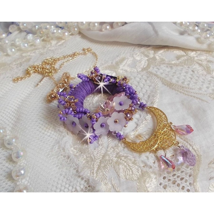 Laureline pendant necklace embroidered with purple DMC cotton, Swarovski crystals and frosted flowers.