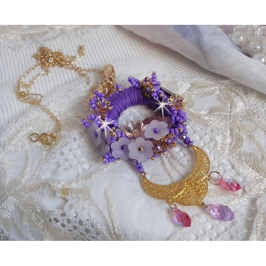 Laureline pendant necklace embroidered with purple DMC cotton, Swarovski crystals and frosted flowers.