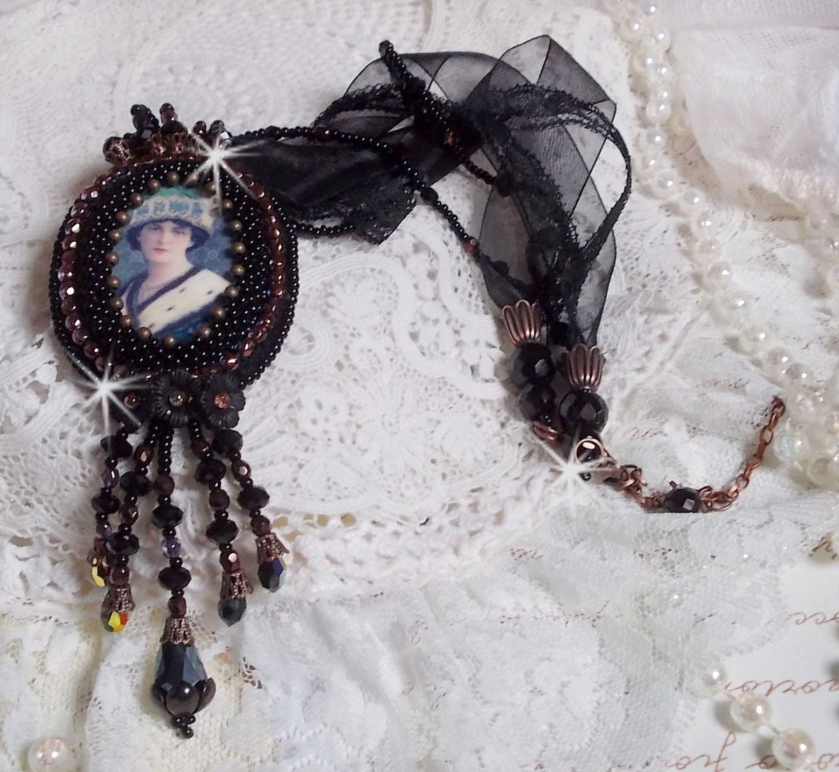 Midnight Daisy pendant necklace dressed in black pearls with Swarovski crystals