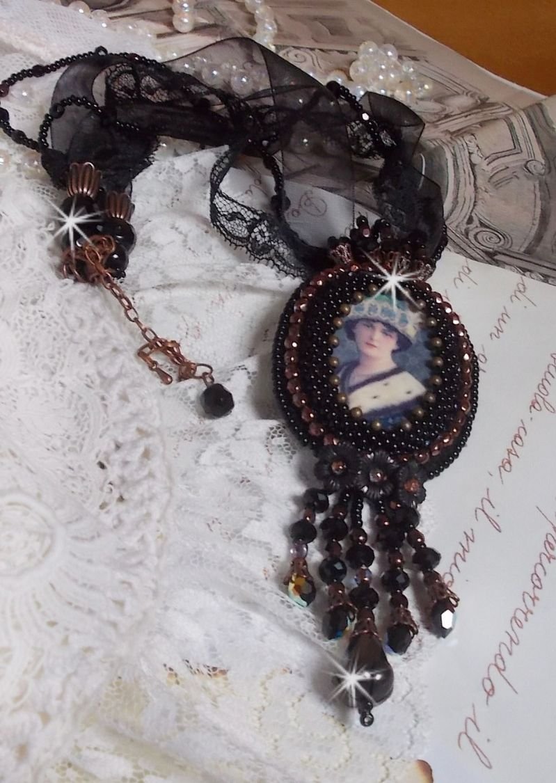 Midnight Daisy pendant necklace dressed in black pearls with Swarovski crystals