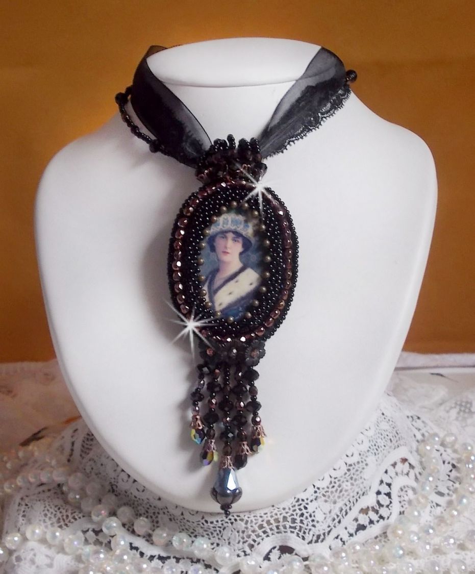 Midnight Daisy pendant necklace dressed in black pearls with Swarovski crystals