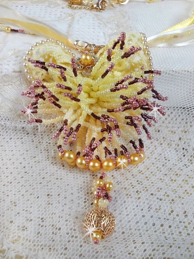 La Petite Robe Jaune pendant necklace with seed beads, Swarovski beads and others.