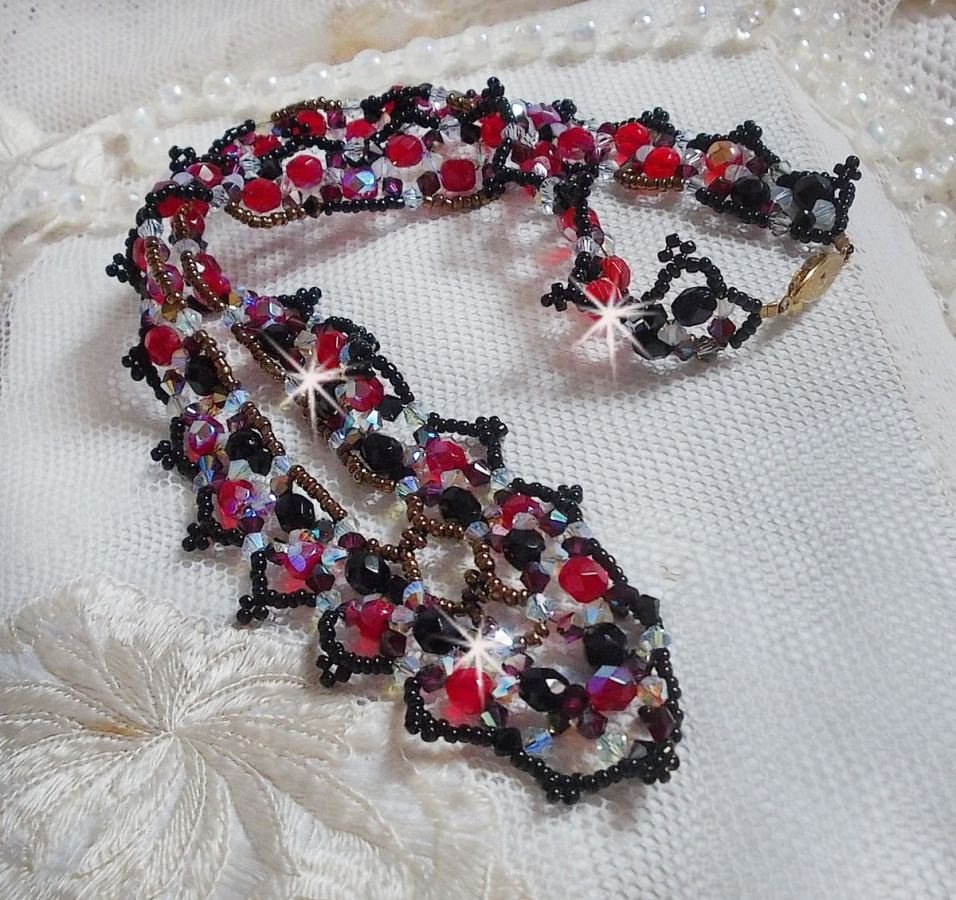 Ruby and Black necklace with Swarovski crystal facets and spinners