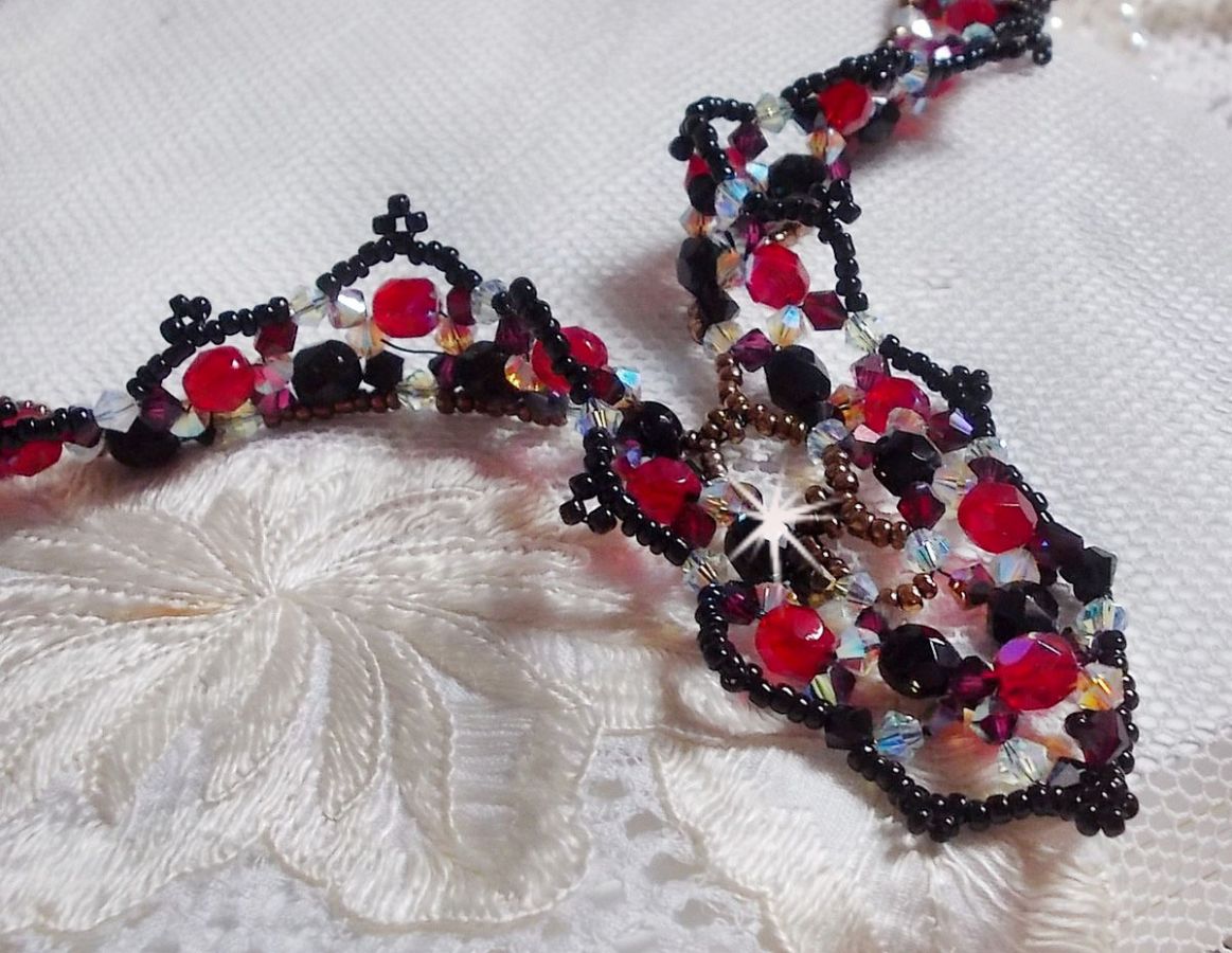 Ruby and Black necklace with Swarovski crystal facets and spinners