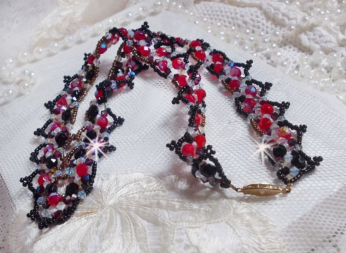 Ruby and Black necklace with Swarovski crystal facets and spinners