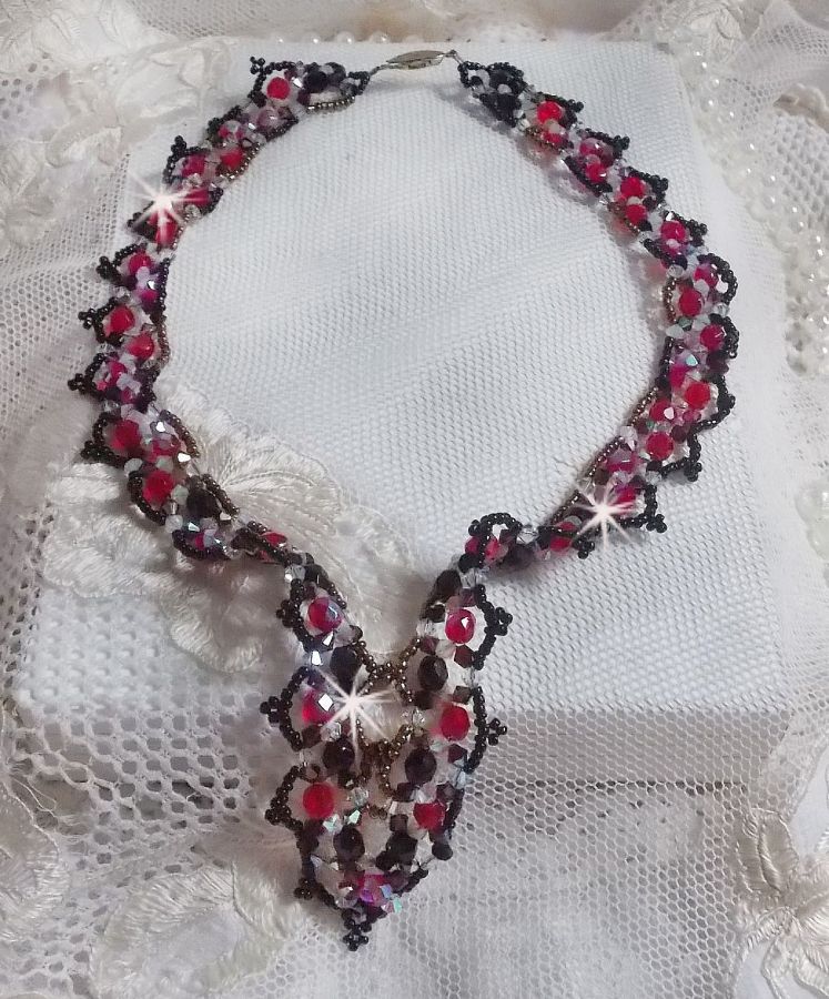 Ruby and Black necklace with Swarovski crystal facets and spinners