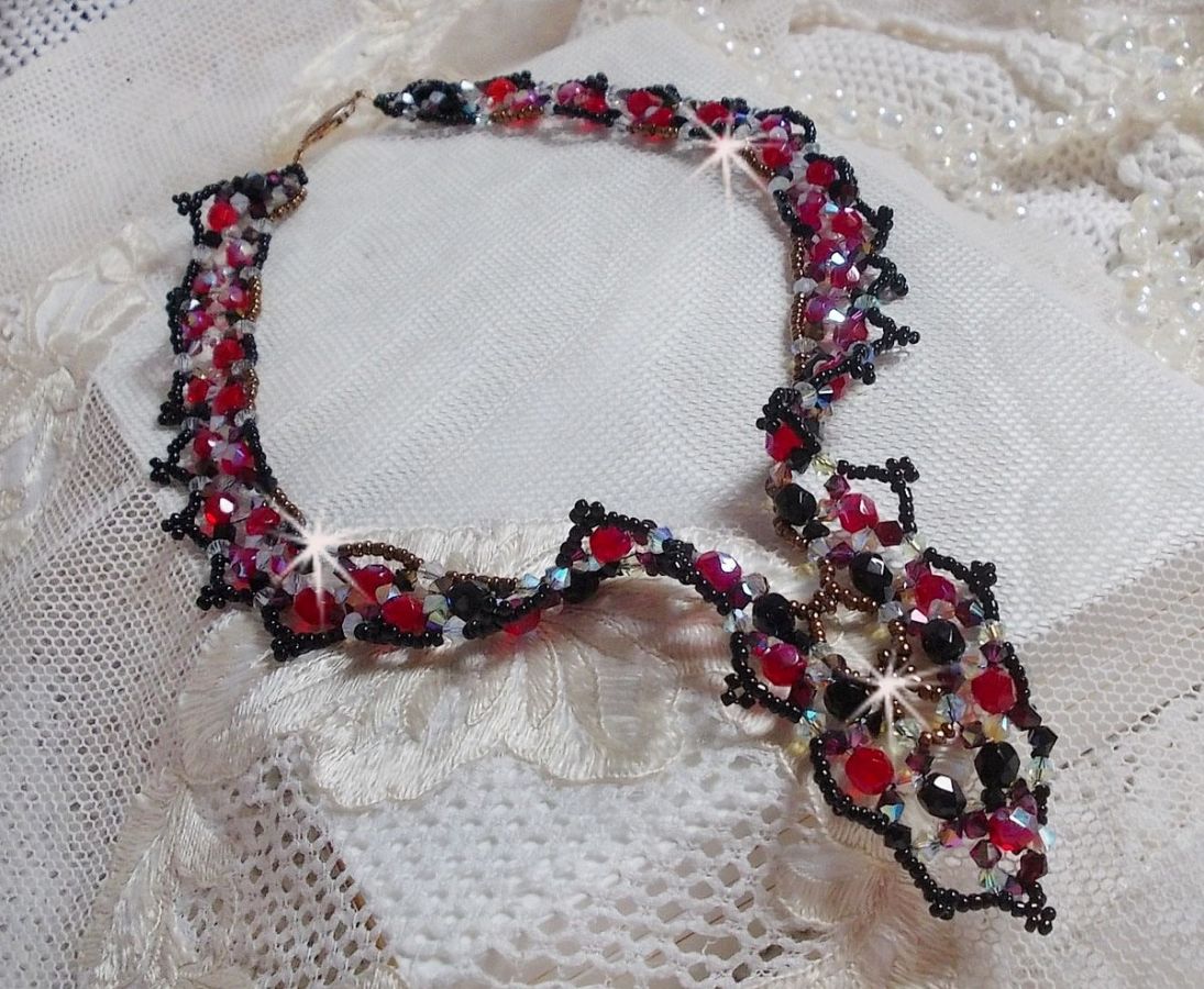 Ruby and Black necklace with Swarovski crystal facets and spinners