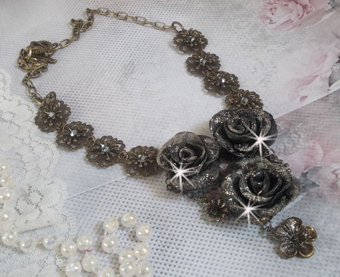 Steampunk Queen necklace created with black and brown porcelain roses, crystal cabochons and bronze accessories