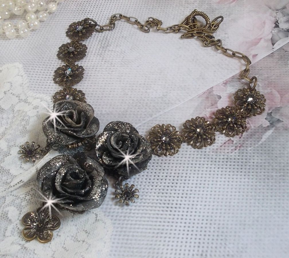 Steampunk Queen necklace created with black and brown porcelain roses, crystal cabochons and bronze accessories