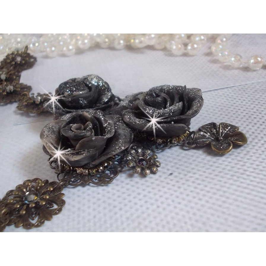 Steampunk Queen necklace created with black and brown porcelain roses, crystal cabochons and bronze accessories