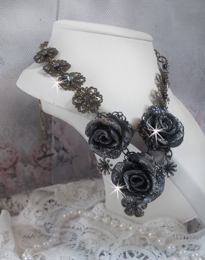 Steampunk Queen necklace created with black and brown porcelain roses, crystal cabochons and bronze accessories