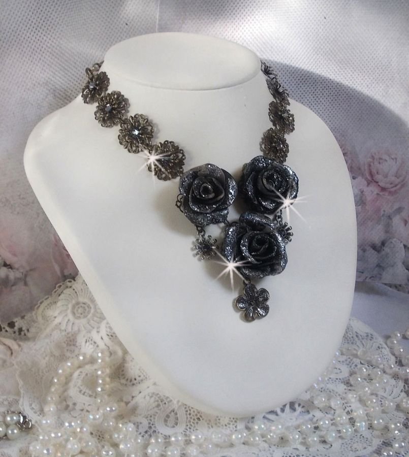 Steampunk Queen necklace created with black and brown porcelain roses, crystal cabochons and bronze accessories