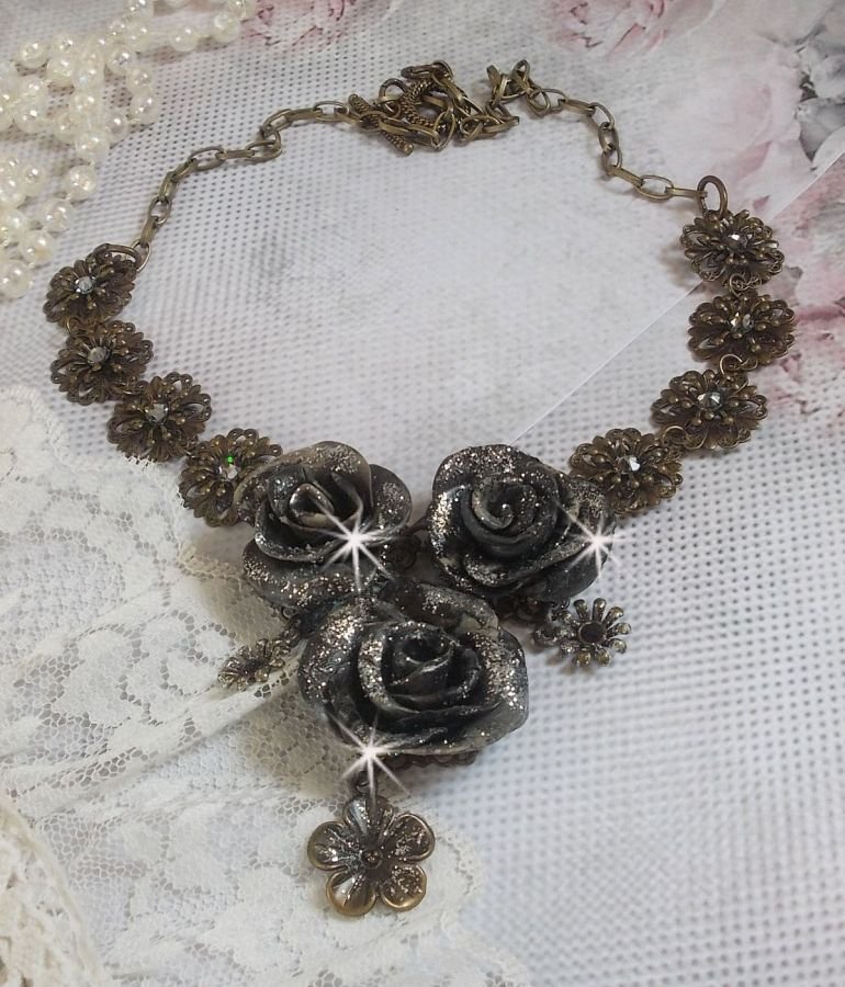 Steampunk Queen necklace created with black and brown porcelain roses, crystal cabochons and bronze accessories