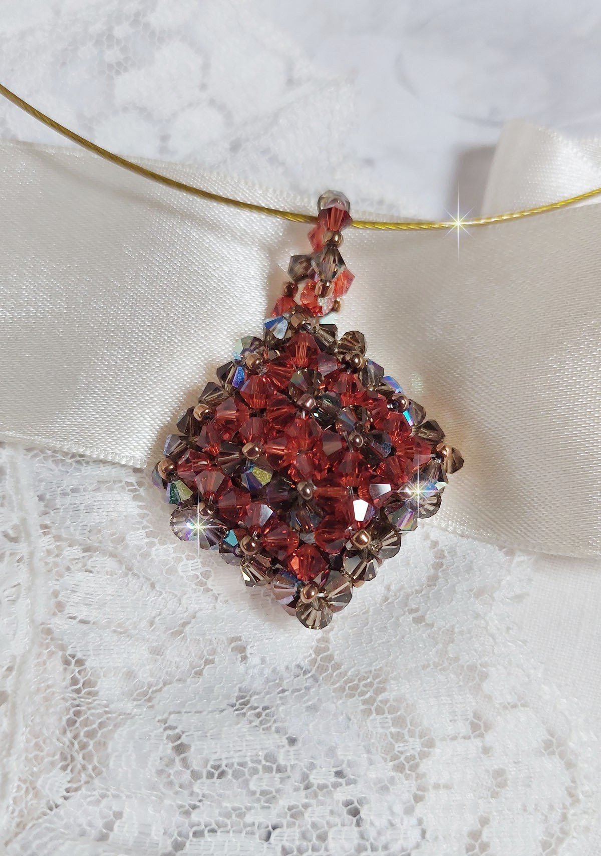 Camel pendant mounted with Swarovski crystal facets and spinners