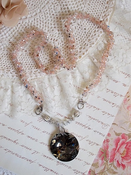 Coco pendant necklace embroidered with Swarovski crystals and a smoked crystal medallion