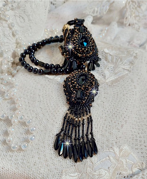 Black Habit Pendant embroidered with round Onyx stones, faceted pendants, faceted cylinder beads, facets and quality seed beads