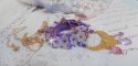Laureline pendant necklace embroidered with purple DMC cotton, Swarovski crystals and frosted flowers.