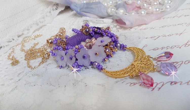 Laureline pendant necklace embroidered with purple DMC cotton, Swarovski crystals and frosted flowers.