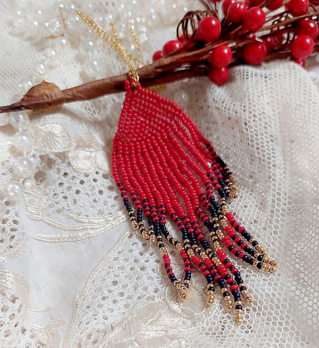 Red Swirls Pendant created with quality seed beads and a gold-plated chain