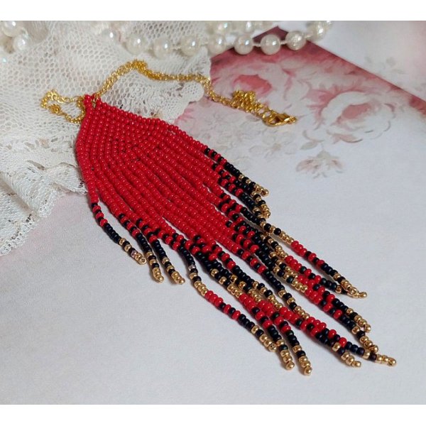Red Swirls Pendant created with quality seed beads and a gold-plated chain