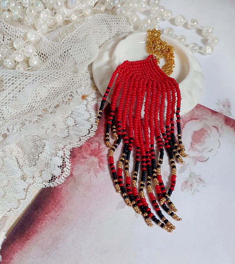 Red Swirls Pendant created with quality seed beads and a gold-plated chain