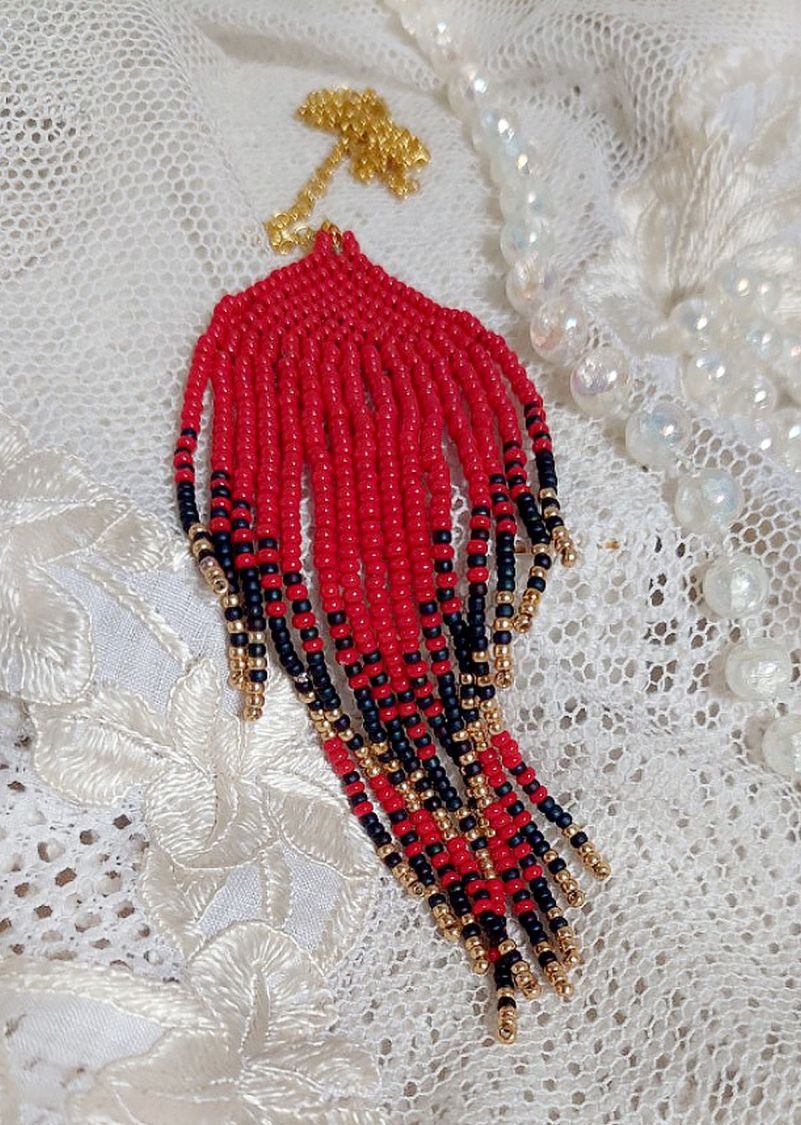 Red Swirls Pendant created with quality seed beads and a gold-plated chain