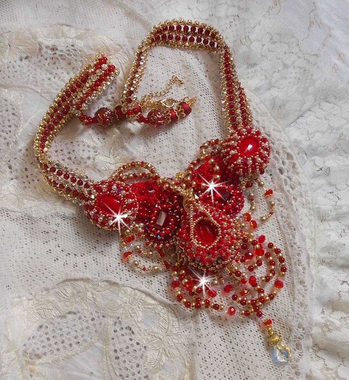 Ruby necklace embroidered with red agate and semi-precious coral beads Haute-Couture style