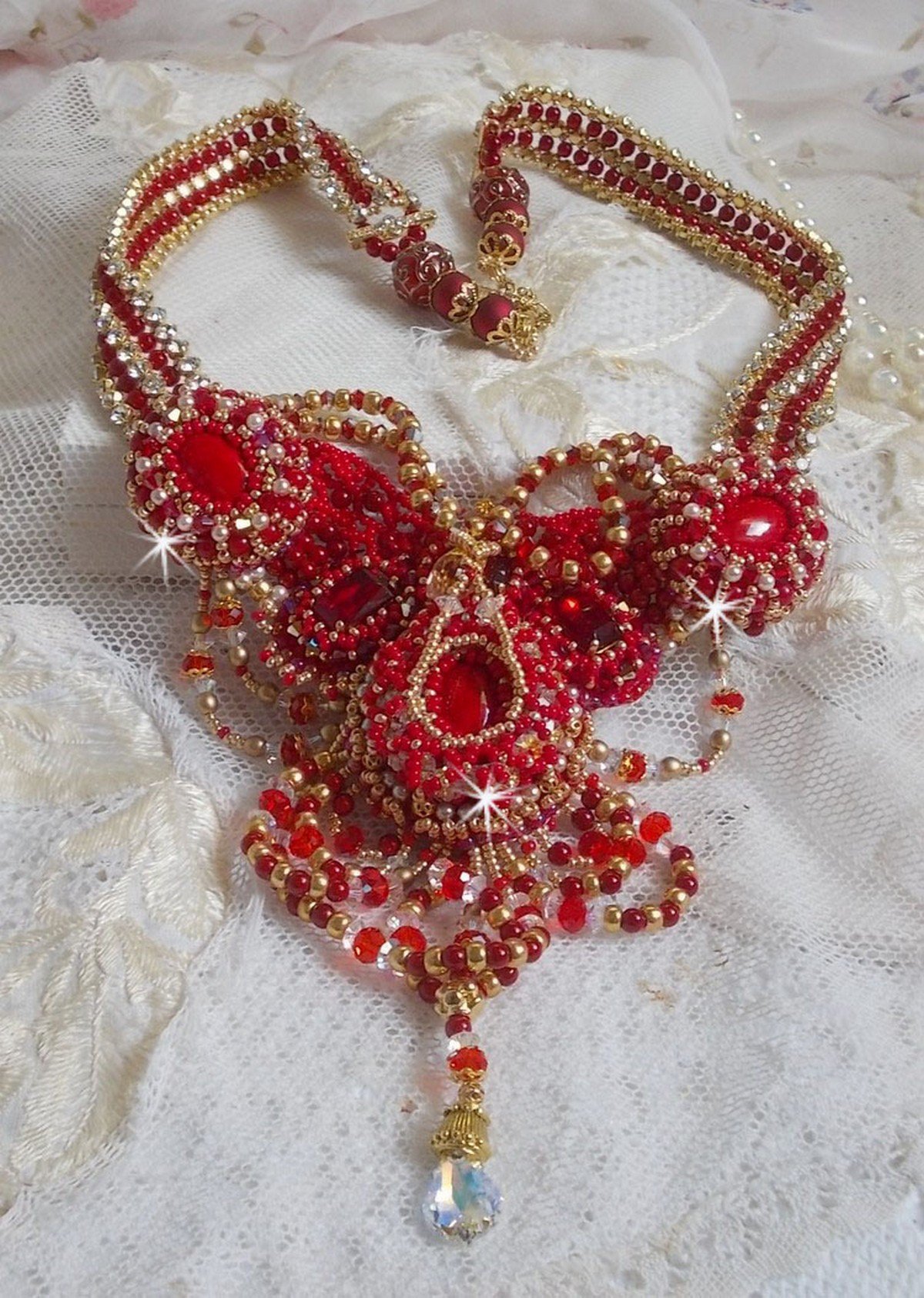 Ruby necklace embroidered with red agate and semi-precious coral beads Haute-Couture style