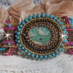 Cheyenne cuff bracelet embroidered with a gemstone, a Fuchsite ruby with Miyuki seed beads and Czech seed beads.