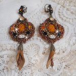 BO Amber Romance created with a caramel colored cowhide, Swarovski crystals