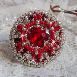 Drigon Red ring embroidered with a red Swarovski crystal cabochon, silver bezels and seed beads