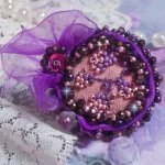 Romantic Lady Ring embroidered with on a pink linen fabric with Pink, Iris, Purple and Peach seed beads 