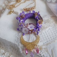 Laureline pendant necklace embroidered with purple DMC cotton, Swarovski crystals and frosted flowers.