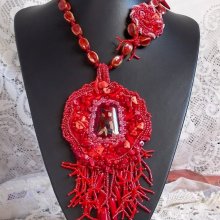 Coralie pendant necklace embroidered with abundant semi-precious stones.