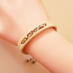 Florâme plant bracelet with Ava liberty ribbon on white cork