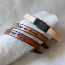 Adjustable leather strap with black clasp to personalize by engraving 