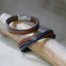 Two-tone crossed leather cuff bracelet with engraved message for men