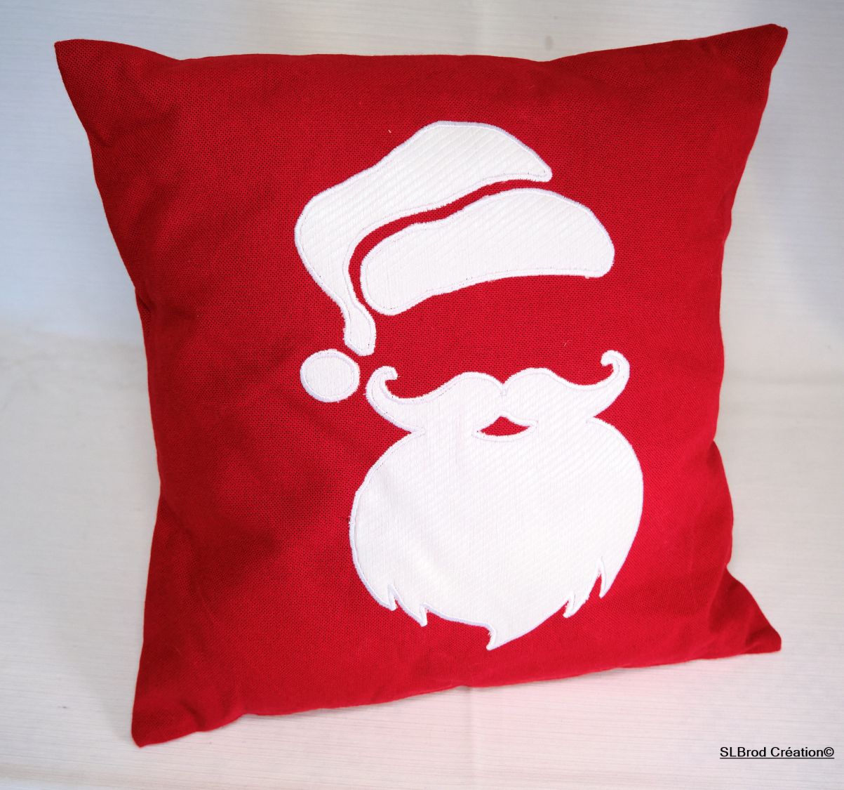 Cushion cover Santa Claus head in appliqué