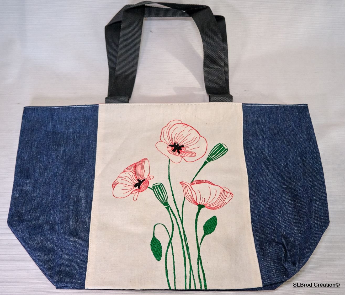 Shopping bag with poppy pattern on white background