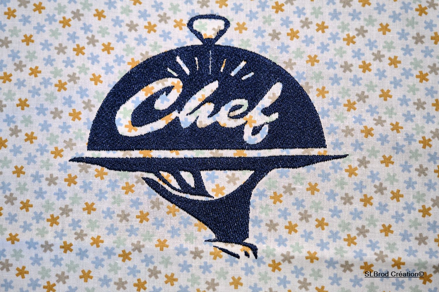 Embroidered children's apron