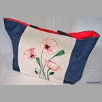 Shopping bag with poppy pattern on white background